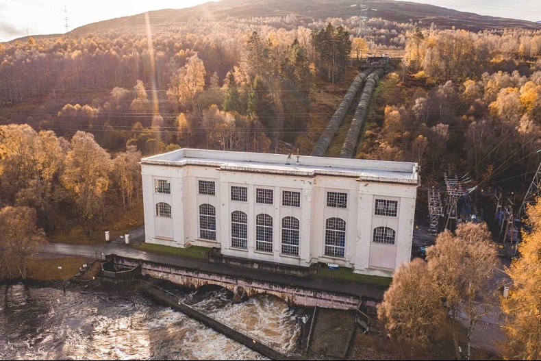 The Tummel Bridge hydro power station taken via a drone, with the inlet pipes visible in the background.